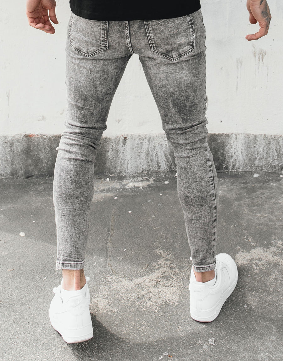 Avora London Conrad Skinny Rip and Patch Jeans in Washed Grey
