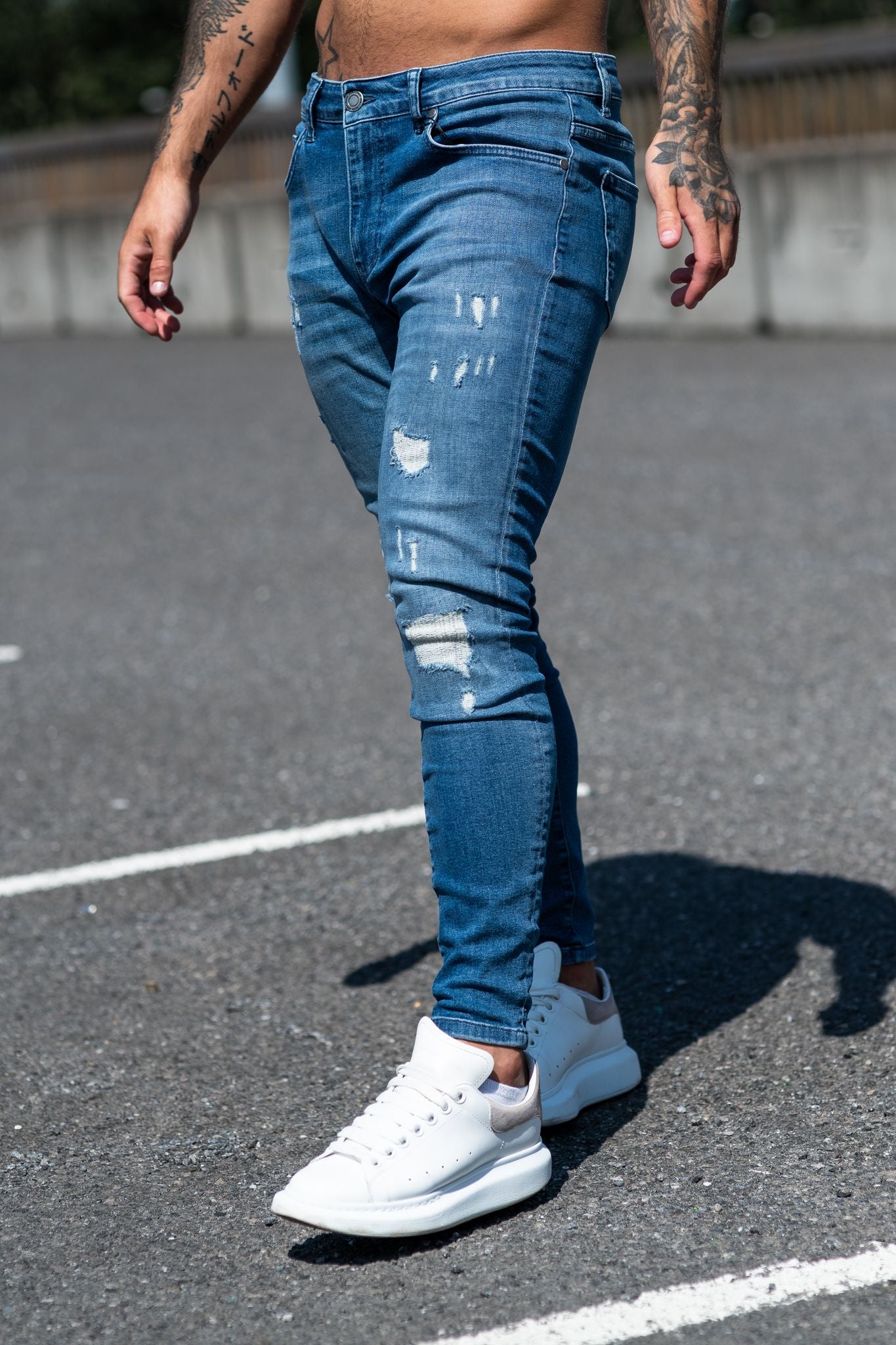 Avora London Rae Skinny Rip & Repaired Jeans in Mid Wash Blue