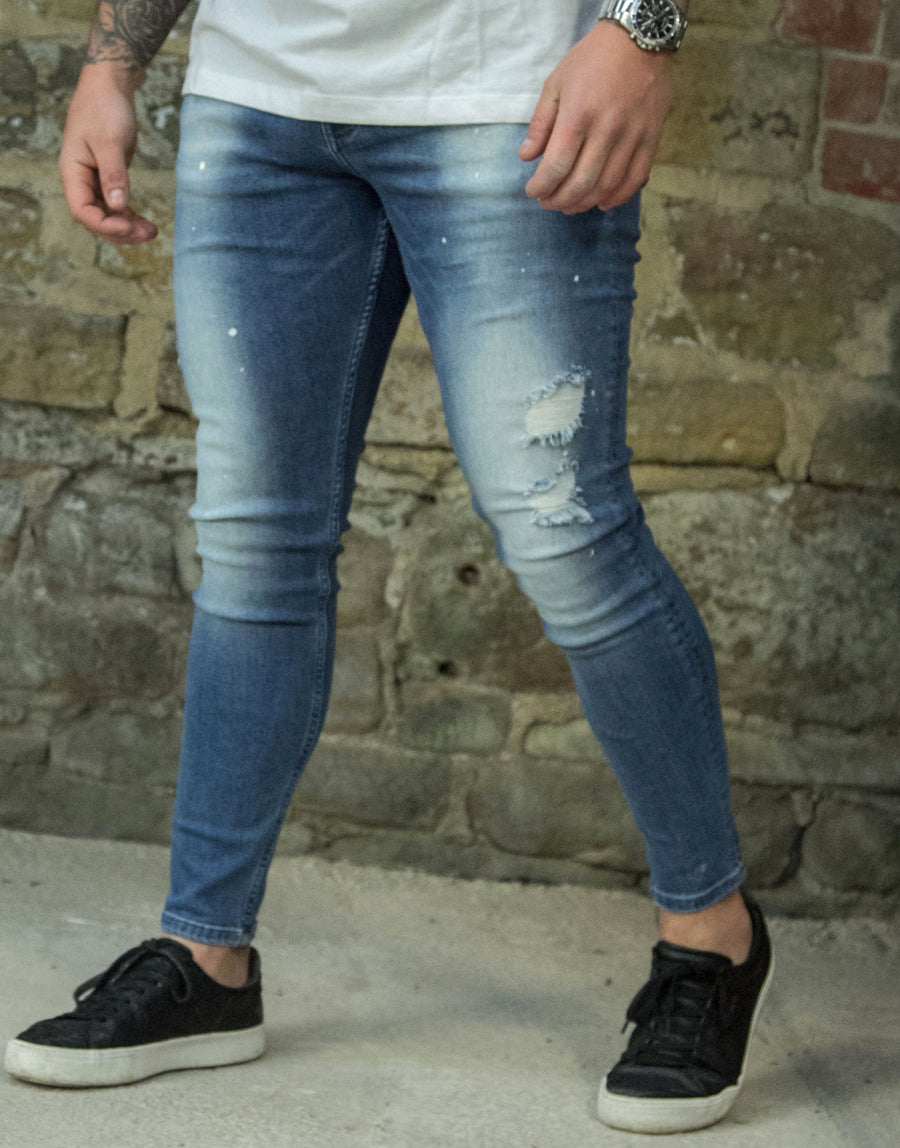 Avora London Mayor Skinny Repair Paint Jeans in Mid Wash Blue