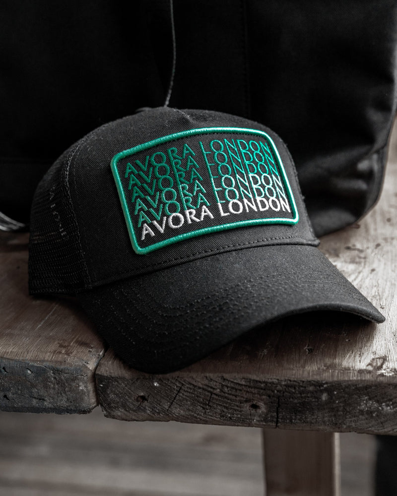Avora London Wren Mesh Trucker Cap in Black/Green