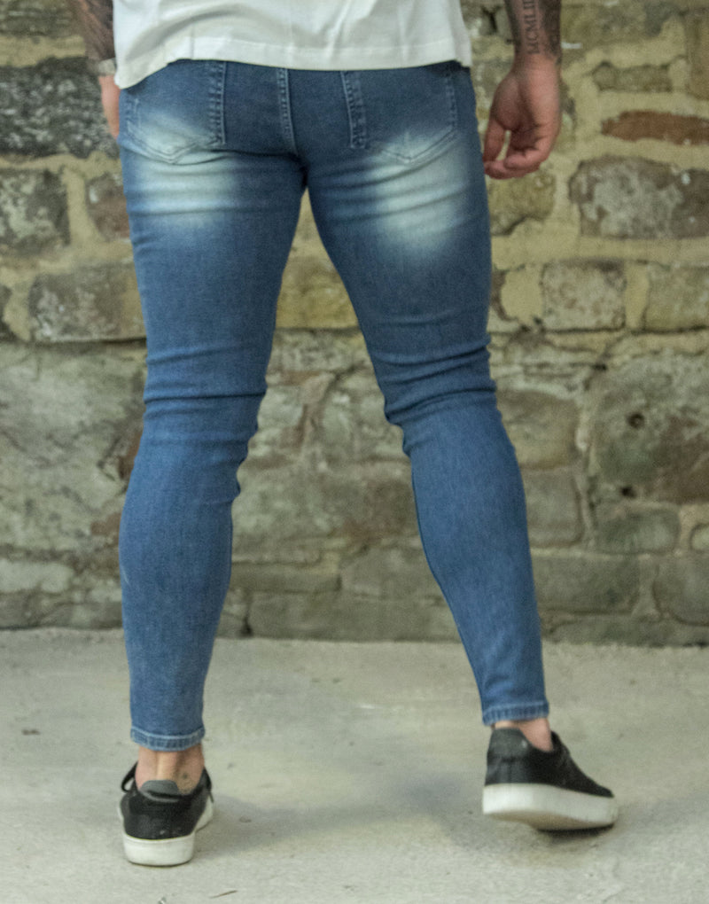 Avora London Mayor Skinny Repair Paint Jeans in Mid Wash Blue